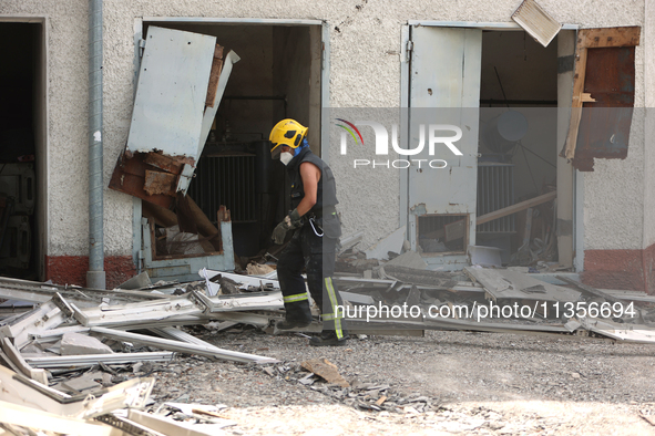 A rescuer is removing the rubble at the Ivano-Frankivsk National Technical University of Oil and Gas, damaged by a Russian missile attack, i...