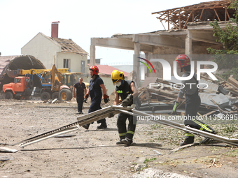 Rescuers are removing the rubble at the Ivano-Frankivsk National Technical University of Oil and Gas damaged by a Russian missile attack in...