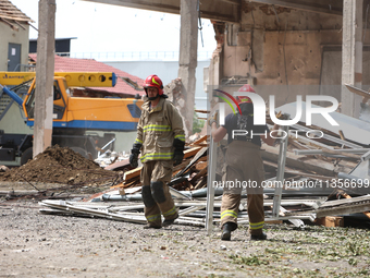 Rescuers are removing the rubble at the Ivano-Frankivsk National Technical University of Oil and Gas damaged by a Russian missile attack in...