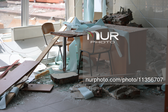 The rubble is covering a table and chairs at the Ivano-Frankivsk National Technical University of Oil and Gas, damaged by a Russian missile...