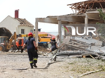 Rescuers are removing the rubble at the Ivano-Frankivsk National Technical University of Oil and Gas damaged by a Russian missile attack in...