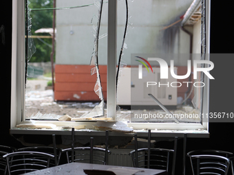 A broken window is being pictured at the Ivano-Frankivsk National Technical University of Oil and Gas, damaged by a Russian missile attack,...