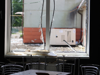 A broken window is being pictured at the Ivano-Frankivsk National Technical University of Oil and Gas, damaged by a Russian missile attack,...