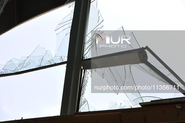 A broken window is being pictured at the Ivano-Frankivsk National Technical University of Oil and Gas, damaged by a Russian missile attack,...