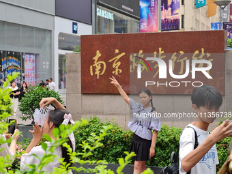 Chinese and foreign tourists are bustling along the Nanjing Road Pedestrian street in Shanghai, China, on June 24, 2024. (