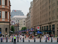 Chinese and foreign tourists are bustling along the Nanjing Road Pedestrian street in Shanghai, China, on June 24, 2024. (