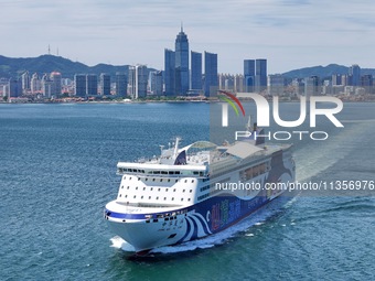 A cruise-type luxury passenger roller ship is leaving Yantai, China, on June 19, 2024. According to the data of the Ministry of Transport, i...