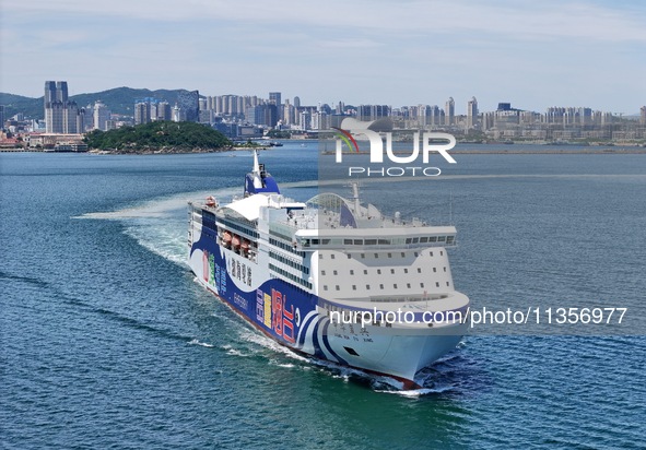 A cruise-type luxury passenger roller ship is leaving Yantai, China, on June 19, 2024. According to the data of the Ministry of Transport, i...