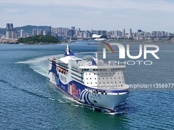 A cruise-type luxury passenger roller ship is leaving Yantai, China, on June 19, 2024. According to the data of the Ministry of Transport, i...