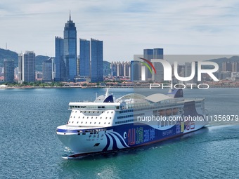 A cruise-type luxury passenger roller ship is leaving Yantai, China, on June 19, 2024. According to the data of the Ministry of Transport, i...