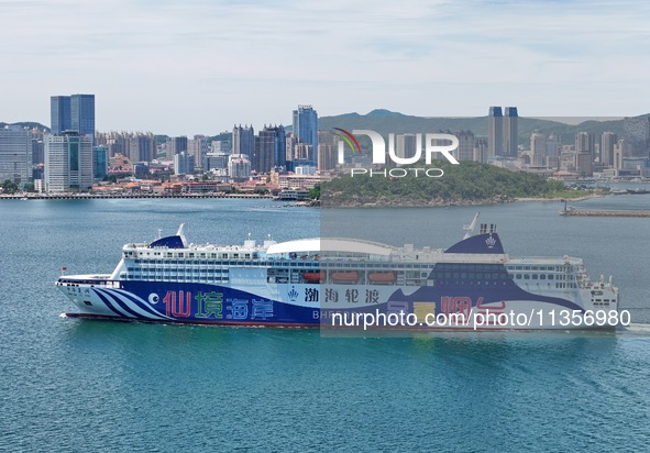 A cruise-type luxury passenger roller ship is leaving Yantai, China, on June 19, 2024. According to the data of the Ministry of Transport, i...