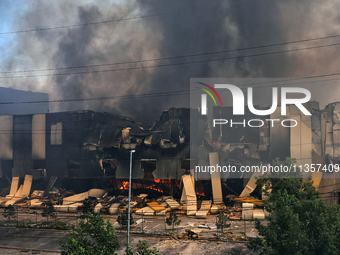 Smoke is rising from a warehouse destroyed as a result of a Russian missile strike in Odesa, Ukraine, on June 24, 2024. NO USE RUSSIA. NO US...