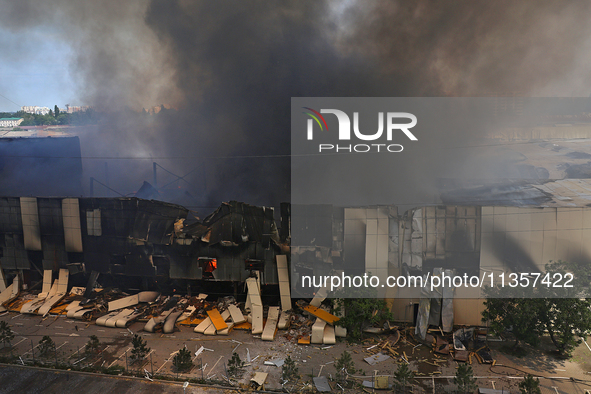 Smoke is rising from a warehouse destroyed as a result of a Russian missile strike in Odesa, Ukraine, on June 24, 2024. NO USE RUSSIA. NO US...