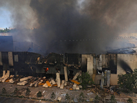 Smoke is rising from a warehouse destroyed as a result of a Russian missile strike in Odesa, Ukraine, on June 24, 2024. NO USE RUSSIA. NO US...