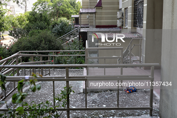 Glass shards are carpeting the ground around an apartment block damaged by a Russian missile attack on civilian infrastructure in Odesa, Ukr...