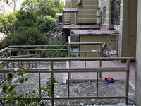 Glass shards are carpeting the ground around an apartment block damaged by a Russian missile attack on civilian infrastructure in Odesa, Ukr...