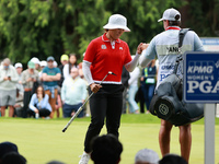 Amy Yang of Republic of Korea celebrates her birdie on the 8th green with her caddie during Day Four of the KPMG Women's PGA Championship at...