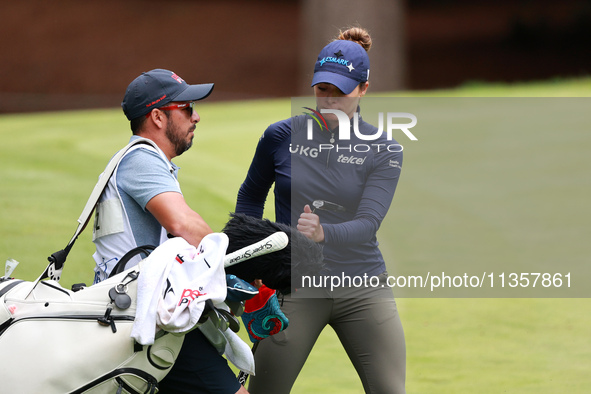 Gaby Lopez of Mexico pulls a club from her bag on the 16th green during Day Four of the KPMG Women's PGA Championship at Sahalee Country Clu...