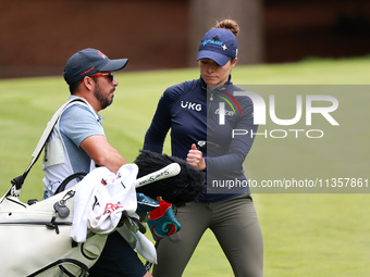 Gaby Lopez of Mexico pulls a club from her bag on the 16th green during Day Four of the KPMG Women's PGA Championship at Sahalee Country Clu...