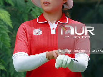 Amy Yang of Republic of Korea puts on her glove at the 4th tee during the final round of the KPMG Women's PGA Championship at Sahalee Countr...