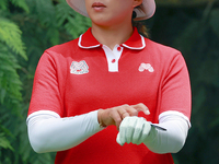 Amy Yang of Republic of Korea puts on her glove at the 4th tee during the final round of the KPMG Women's PGA Championship at Sahalee Countr...