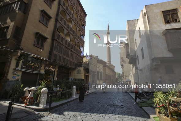 Al-Moez Street in Al-Gamaleya neighborhood next to the Khan Al-Khalili market area, on June 24, 2024, in Cairo, Egypt, is containing the lar...