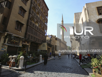 Al-Moez Street in Al-Gamaleya neighborhood next to the Khan Al-Khalili market area, on June 24, 2024, in Cairo, Egypt, is containing the lar...