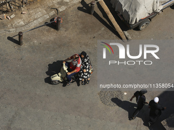 Al-Moez Street in Al-Gamaleya neighborhood next to the Khan Al-Khalili market area, on June 24, 2024, in Cairo, Egypt, is containing the lar...