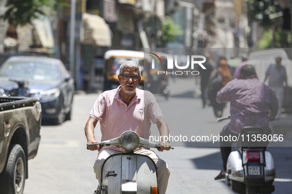 Al-Moez Street in Al-Gamaleya neighborhood next to the Khan Al-Khalili market area, on June 24, 2024, in Cairo, Egypt, is containing the lar...