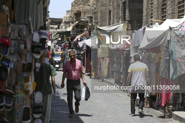 Al-Moez Street in Al-Gamaleya neighborhood next to the Khan Al-Khalili market area, on June 24, 2024, in Cairo, Egypt, is containing the lar...