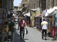 Al-Moez Street in Al-Gamaleya neighborhood next to the Khan Al-Khalili market area, on June 24, 2024, in Cairo, Egypt, is containing the lar...