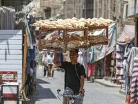 Al-Moez Street in Al-Gamaleya neighborhood next to the Khan Al-Khalili market area, on June 24, 2024, in Cairo, Egypt, is containing the lar...