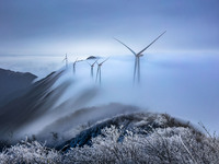 Wind power facilities are being seen at the core observation area of Geyuan, the Chinese Dark Night Starry Sky Protected Area, in Shangrao,...