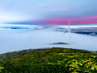 Wind power facilities are being seen at the core observation area of the Chinese Dark Night Starry Sky Protection Geopark in Shangrao, China...