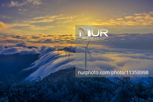 Wind power facilities are being seen at the core observation area of Geyuan, the Chinese Dark Night Starry Sky Protected Area, in Shangrao,...