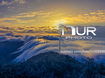 Wind power facilities are being seen at the core observation area of Geyuan, the Chinese Dark Night Starry Sky Protected Area, in Shangrao,...