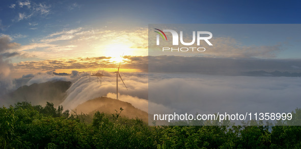 Wind power facilities are being seen at the core observation area of Geyuan, the Chinese Dark Night Starry Sky Protected Area, in Shangrao,...