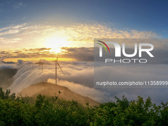 Wind power facilities are being seen at the core observation area of Geyuan, the Chinese Dark Night Starry Sky Protected Area, in Shangrao,...