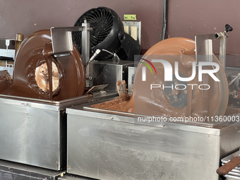 Machines are mixing chocolate at a confectionery shop in Niagara-on-the-Lake, Ontario, Canada, on June 12, 2024. (