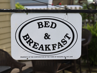 A sign is standing outside a bed and breakfast in Niagara-on-the-Lake, Ontario, Canada, on June 12, 2024. (