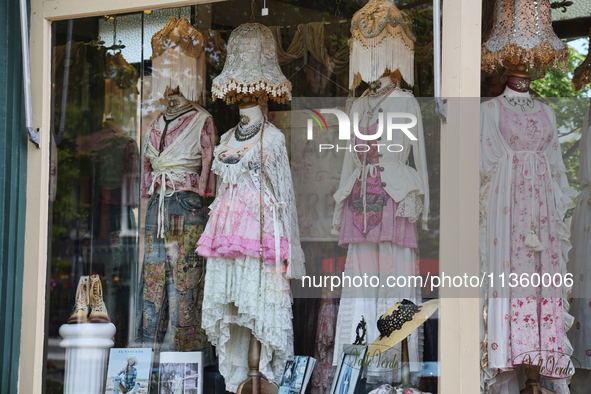 Antiquated clothing is being displayed in the window of a shop in Niagara-on-the-Lake, Ontario, Canada, on June 12, 2024. 