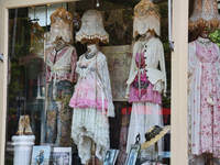 Antiquated clothing is being displayed in the window of a shop in Niagara-on-the-Lake, Ontario, Canada, on June 12, 2024. (