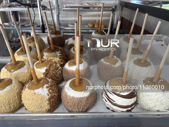 Candy apples are being displayed at a confectionery shop in Niagara-on-the-Lake, Ontario, Canada, on June 12, 2024. 