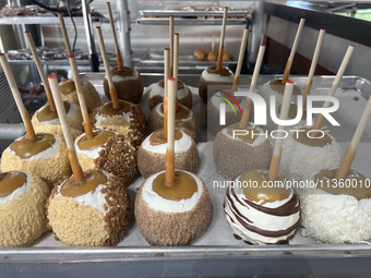 Candy apples are being displayed at a confectionery shop in Niagara-on-the-Lake, Ontario, Canada, on June 12, 2024. (