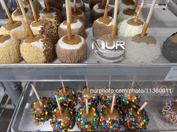 Candy apples are being displayed at a confectionery shop in Niagara-on-the-Lake, Ontario, Canada, on June 12, 2024. 