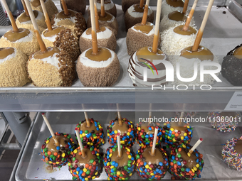 Candy apples are being displayed at a confectionery shop in Niagara-on-the-Lake, Ontario, Canada, on June 12, 2024. (