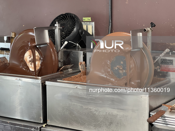 Machines are mixing chocolate at a confectionery shop in Niagara-on-the-Lake, Ontario, Canada, on June 12, 2024. 