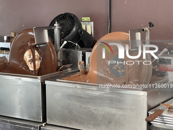 Machines are mixing chocolate at a confectionery shop in Niagara-on-the-Lake, Ontario, Canada, on June 12, 2024. (