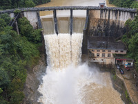 An aerial photo is showing the flood discharge at the Yongli Hydropower Station in Congjiang County, Southwest China's Guizhou Province, on...