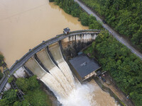 An aerial photo is showing the flood discharge at the Yongli Hydropower Station in Congjiang County, Southwest China's Guizhou Province, on...